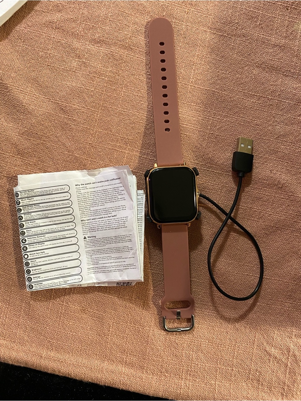 Pink Silicone Smartwatch with Charging Cable